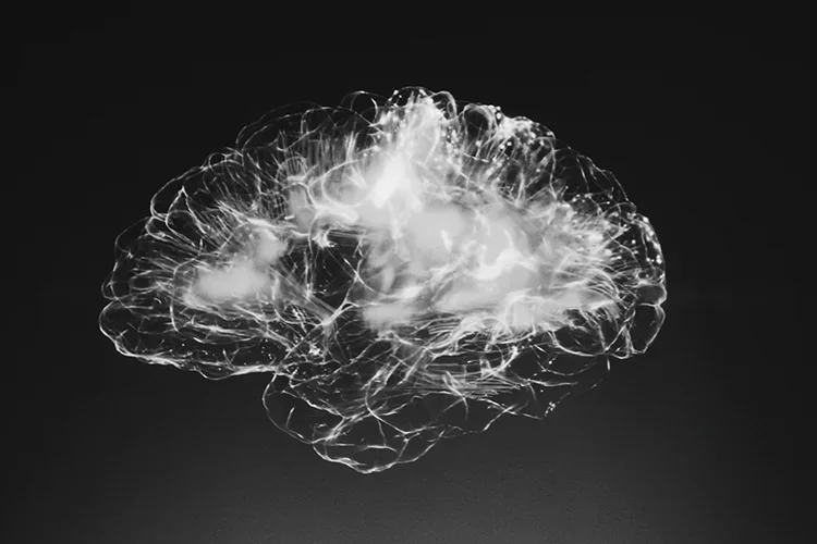 An abstract, glowing artistic representation of a human brain symbolizing nervous system activity and pain processing.