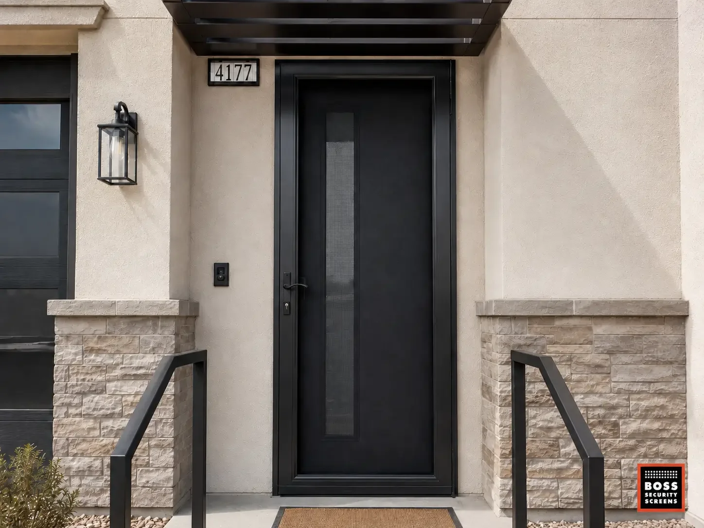 Black security screen panel on a Calabasas front entry blends with the modern door design while adding discreet protection against forced entry.