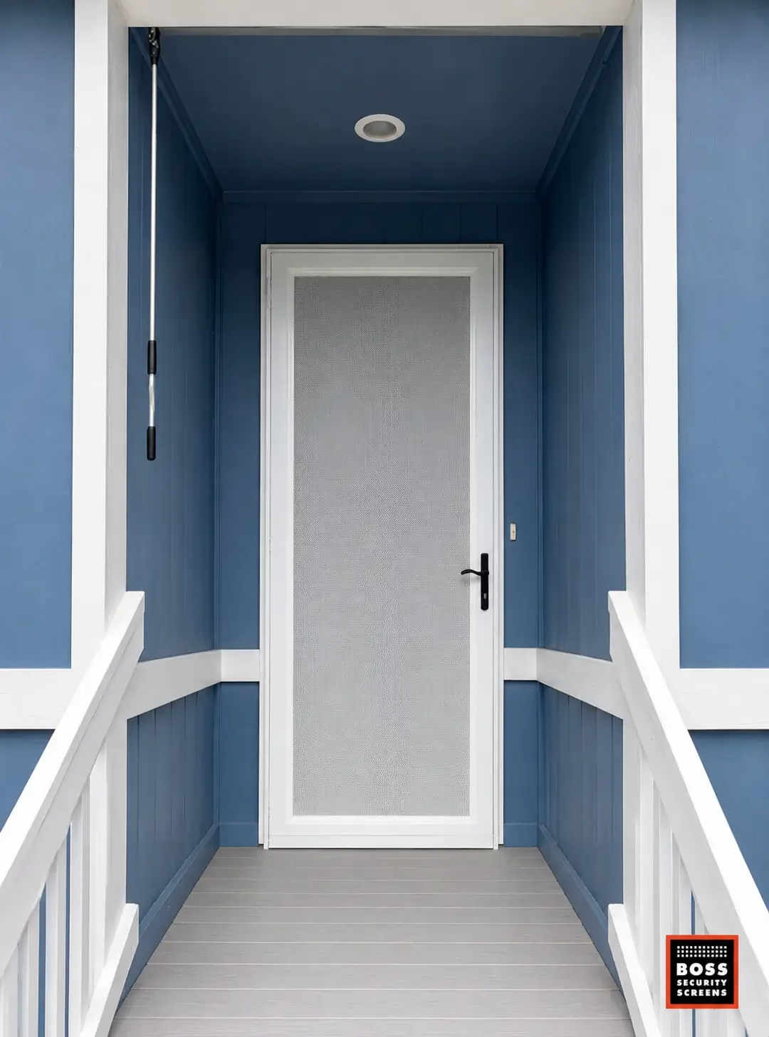 white-single-hinged-security-screen-blue-entryway-stair-landing.webp