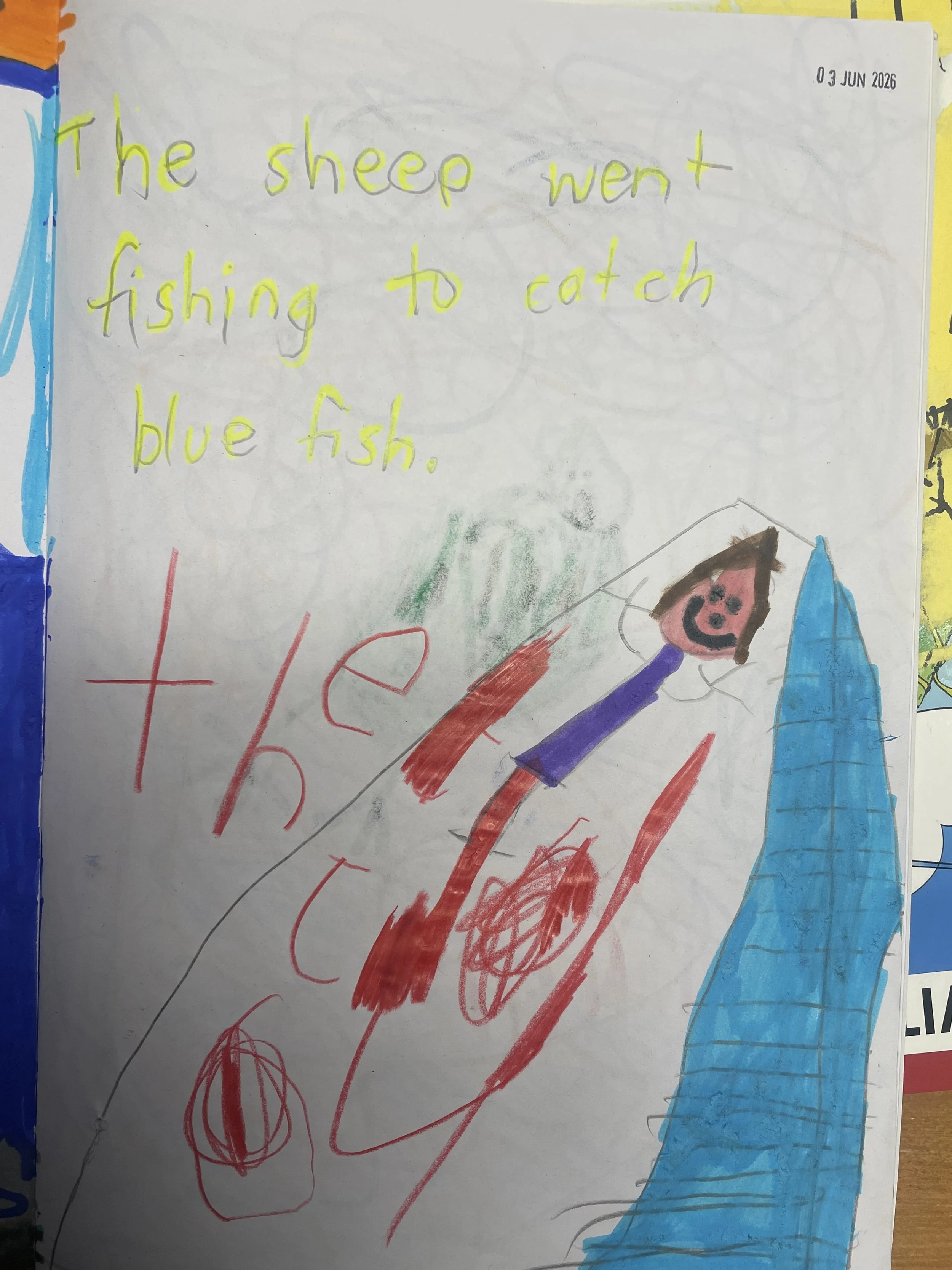 Student writing about Sheepy catching a fish