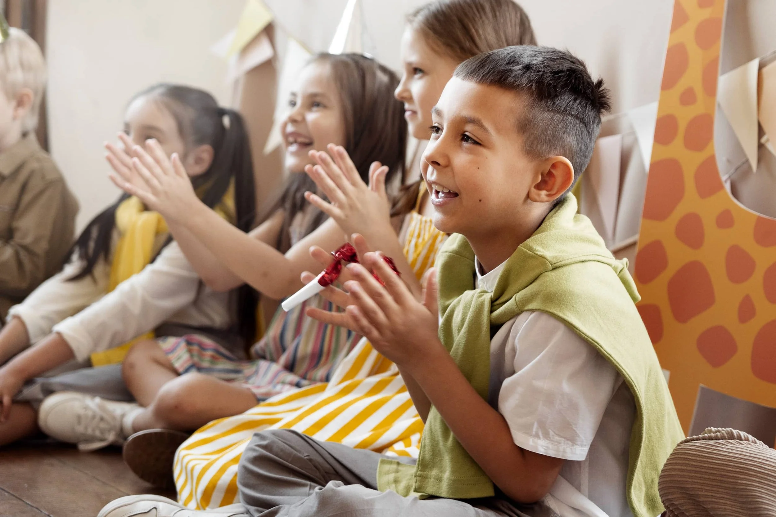 Smiley primary junior kid applauding