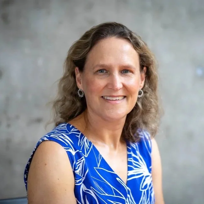 Anne Cust
