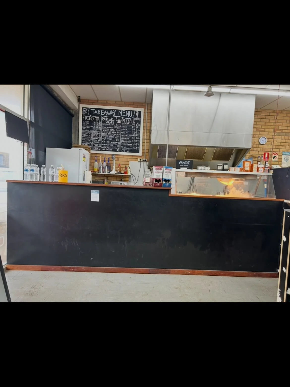 Before and after of a counter wrap and deli fridge wrap at Settlement Supermarker in Simpson. #wrap #oracal #signage #transformation #apostle