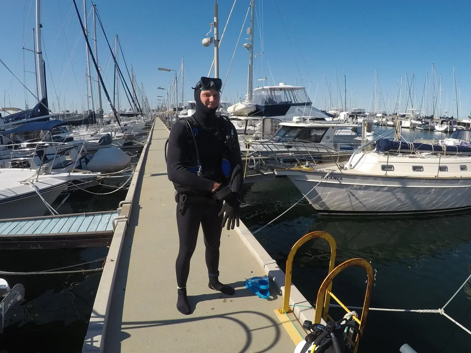 Wet Water WA diver on the jetty after an underwater hull clean in Perth