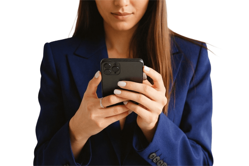 A woman in a blue suit using a smartphone