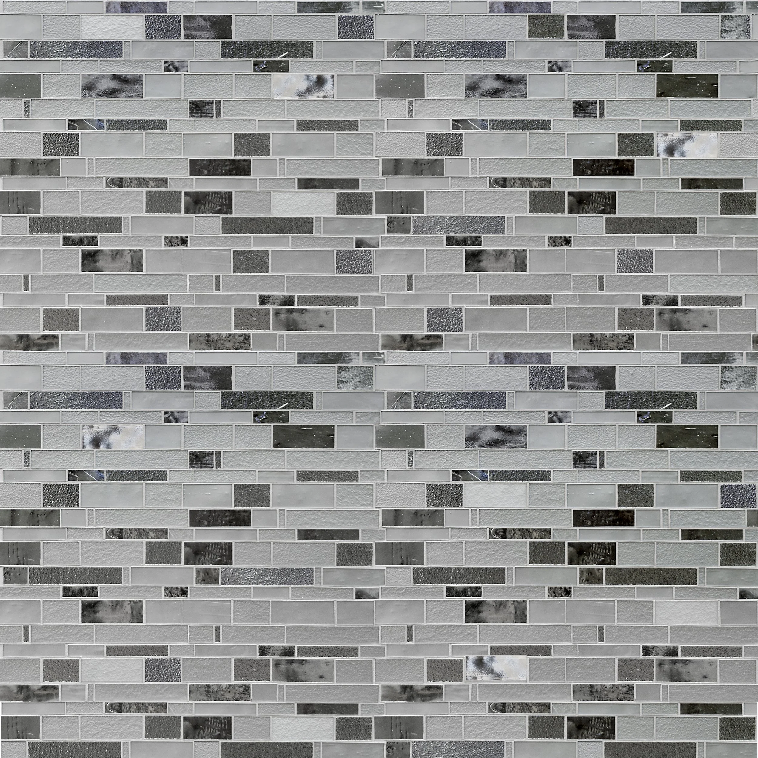 Close-up of a tiled wall with rectangular tiles in shades of gray, black, and marble patterns.