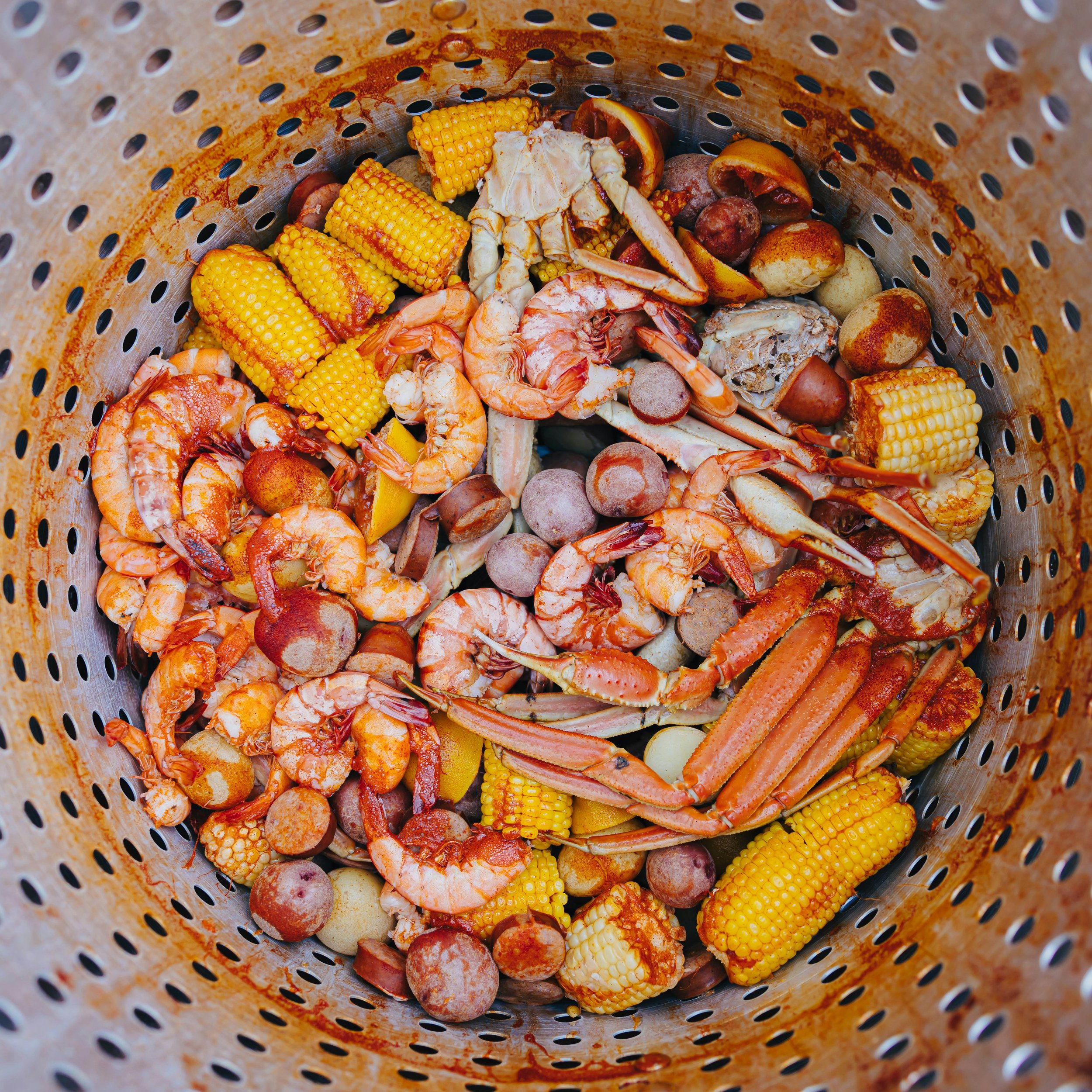 The History of the New England Lobster Bake: Fire, Salt, and Tradition