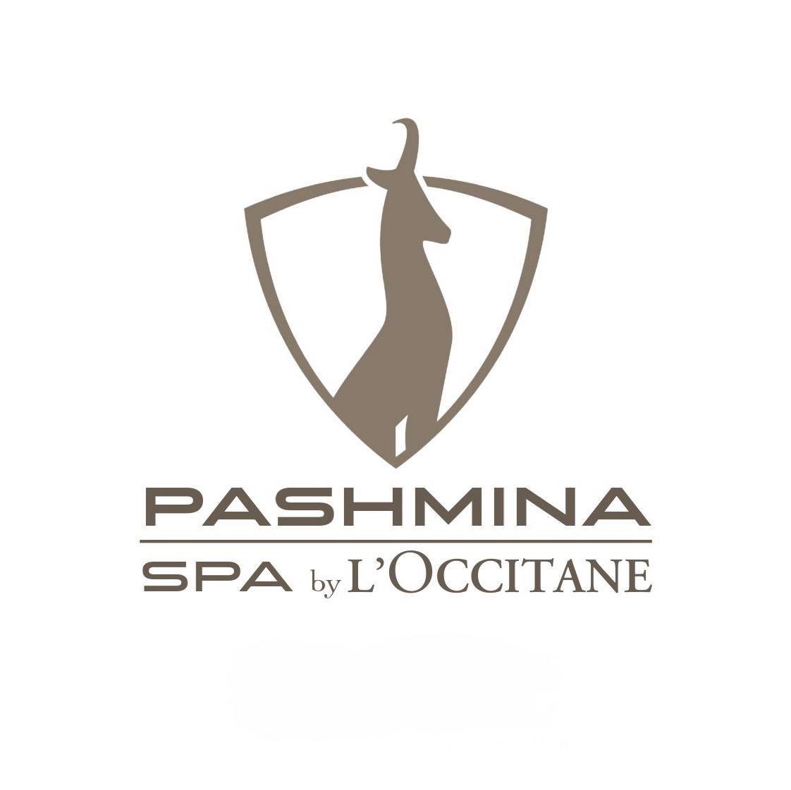 Logo du spa Pashmina par L'Occitane, avec une silhouette d'une chèvre dans un bouclier.
