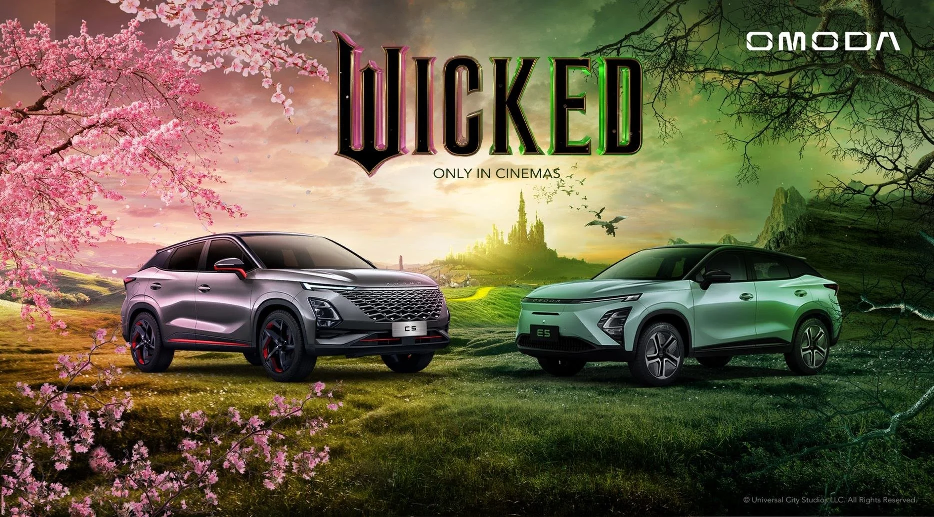 Promotional image for the movie 'Wicked' showing two SUVs, a silver and a white, in a surreal landscape with blooming pink cherry blossom trees and green hills. The title 'Wicked' is prominent at the top, with the subtitle 'Only in Cinemas.' The word