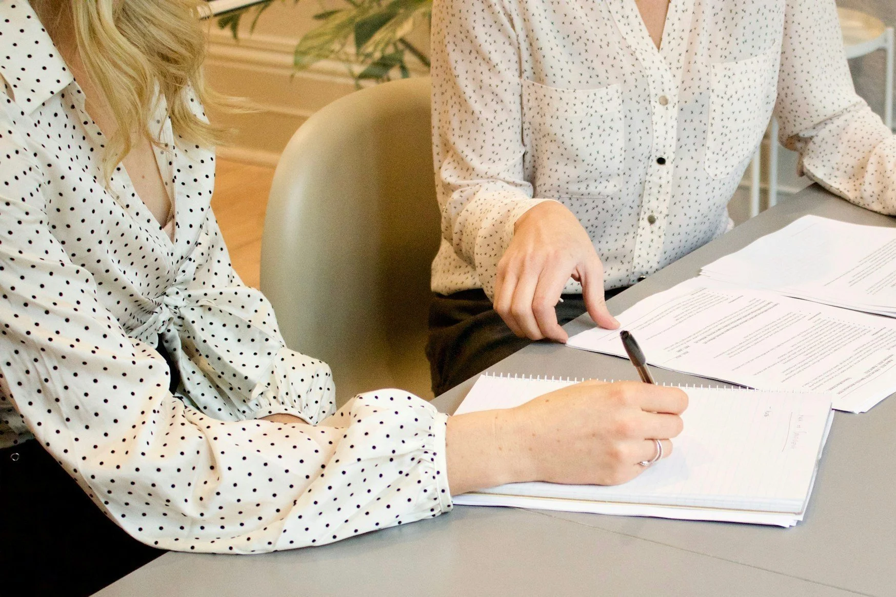 A teacher and a student participating in a tutoring session.