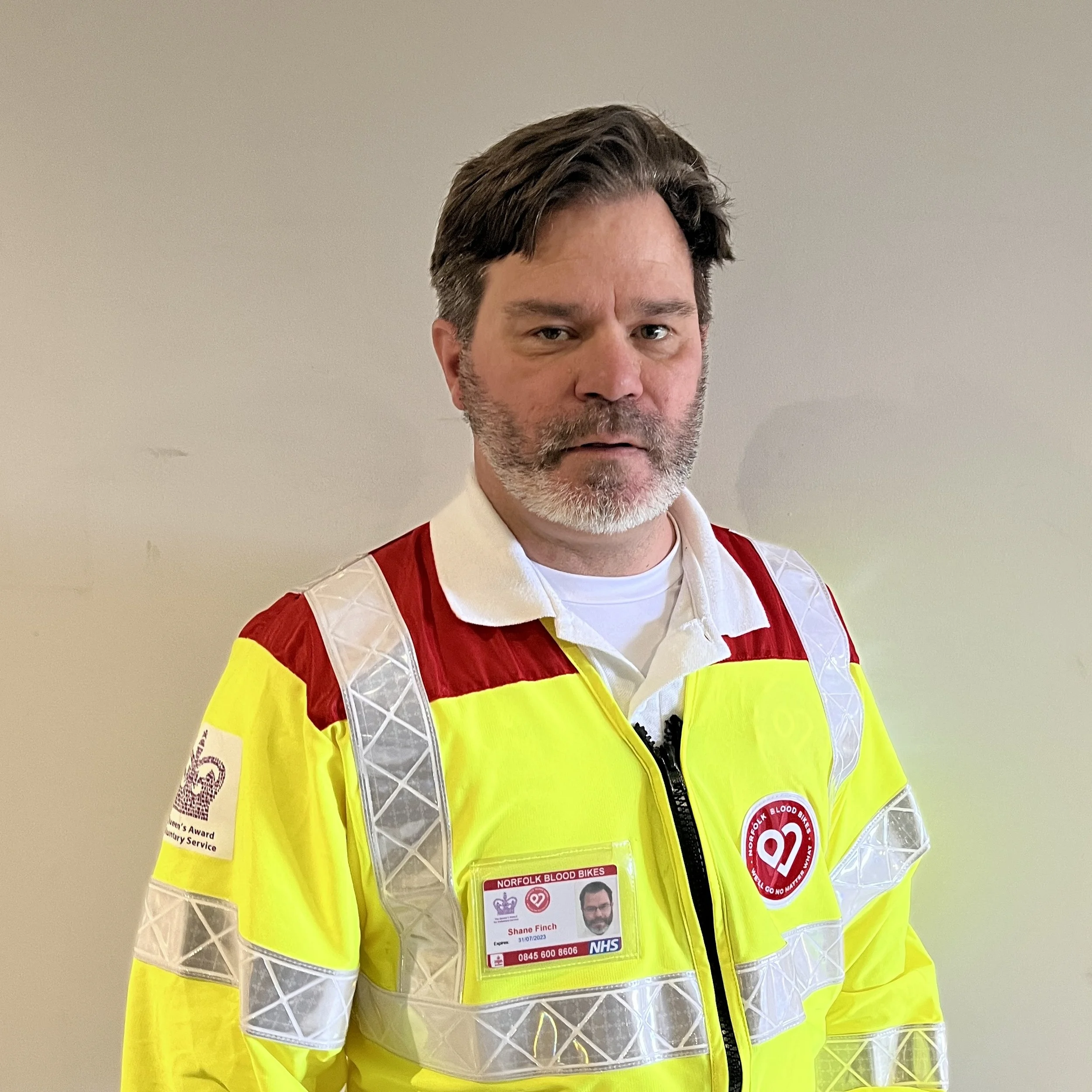 A pink background with a white heart shape and the word "vacancy" repeated in a circle around it.