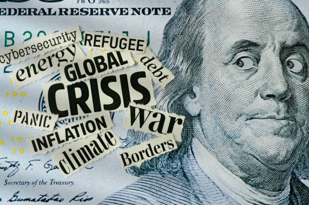 Collage of a ten-dollar bill with overlaid text including 'GLOBAL CRISIS', 'war', 'inflation', 'climate', 'refugee', and 'cybersecurity', depicting financial and global issues.
