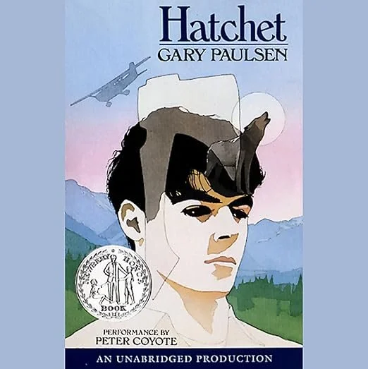 Cover of the book 'Hatchet' by Gary Paulsen, featuring an illustrated portrait of a young boy with a mountain and airplane in the background, and a landscape of mountains and trees.