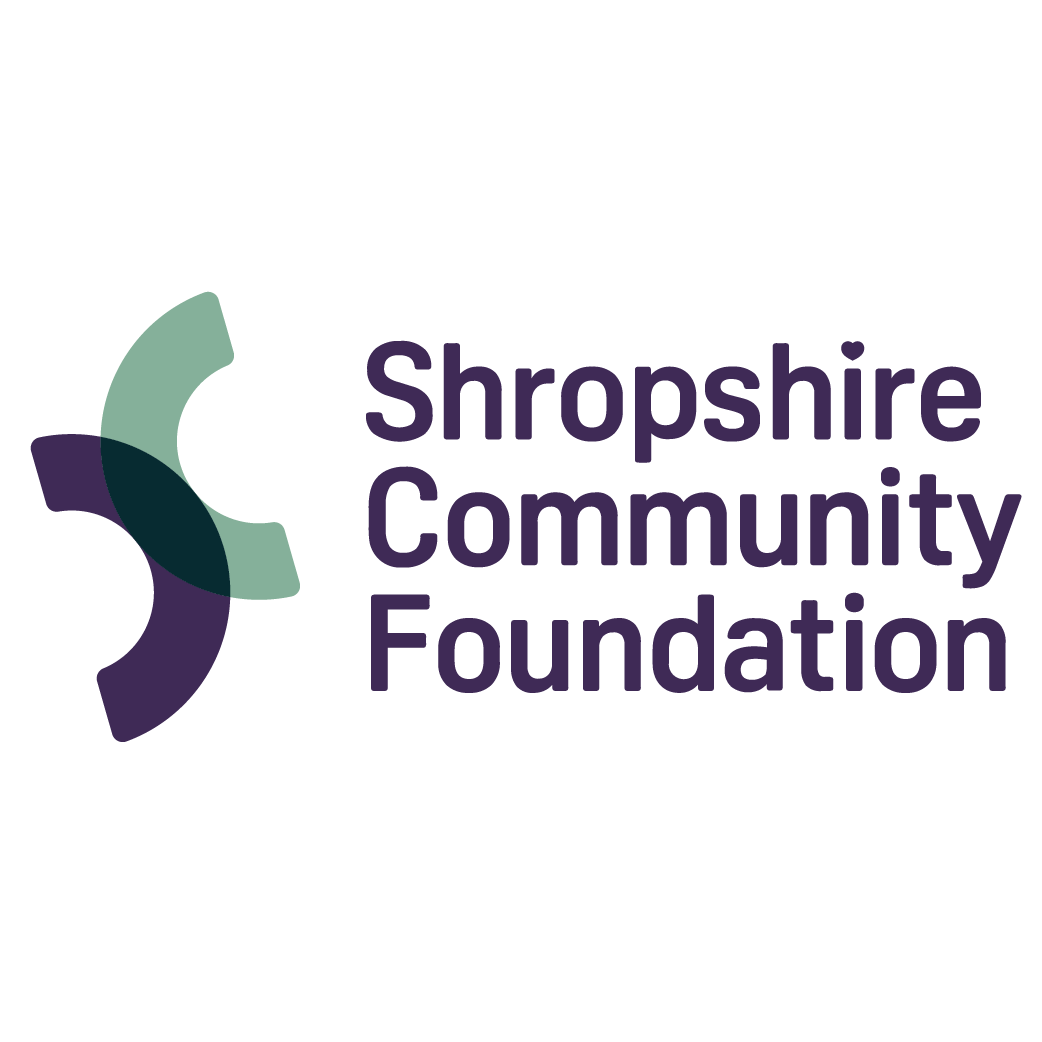 Logo of Shropshire Community Foundation featuring a stylized circular graphic and purple text.