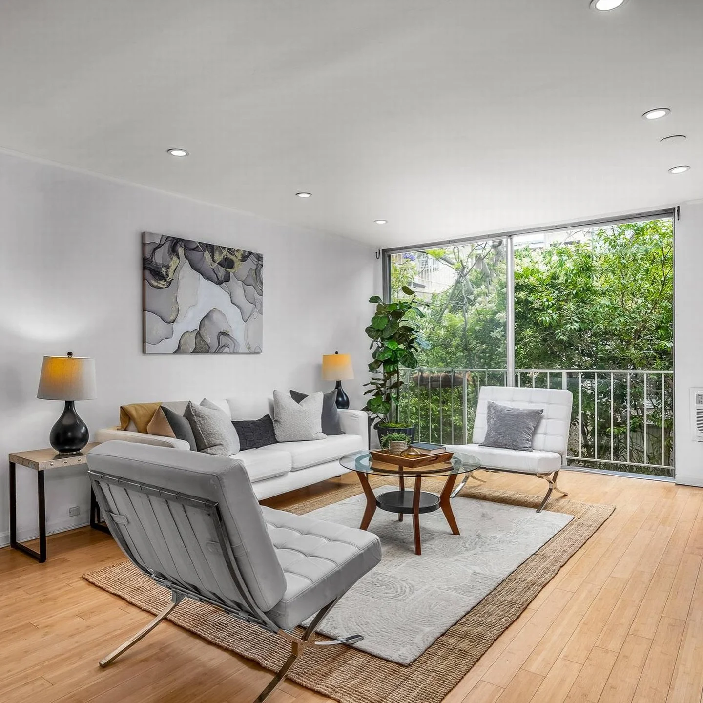 JUST LISTED:  A bright and updated condo in primo Brentwood location - this condo is the kind of space that just feels easy to live in.

Open layout, bamboo floors, a cozy fireplace, and a kitchen designed for both everyday living and hosting. Plus a