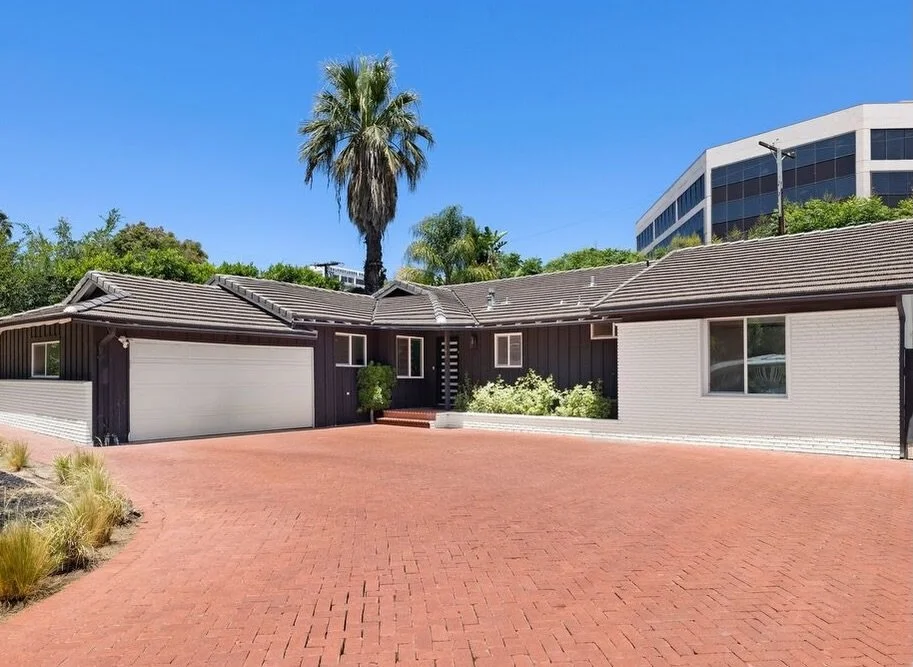 A modern take on the classic California ranch, tucked south of Ventura in Encino.

This beautifully updated, single story Encino home brings together an open, light filled interior and a backyard made for entertaining. 

With a seamless flow between 