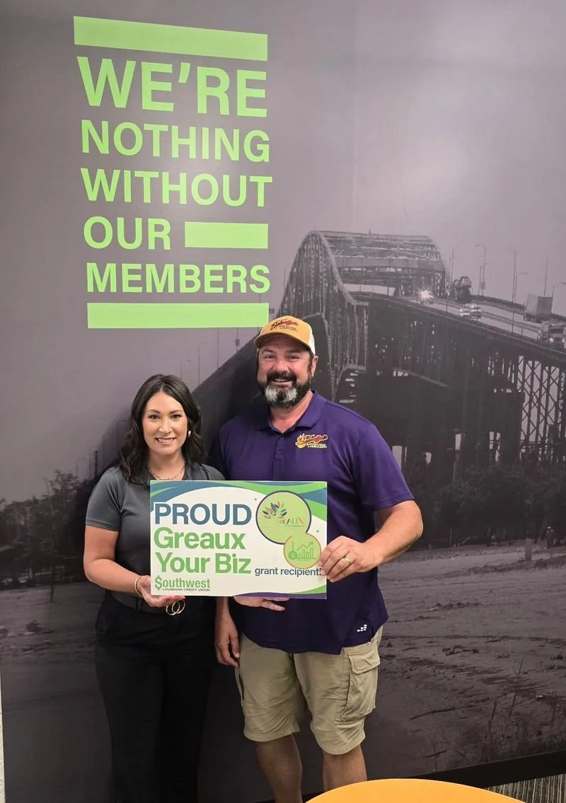 Middle aged couple receive a business grant 