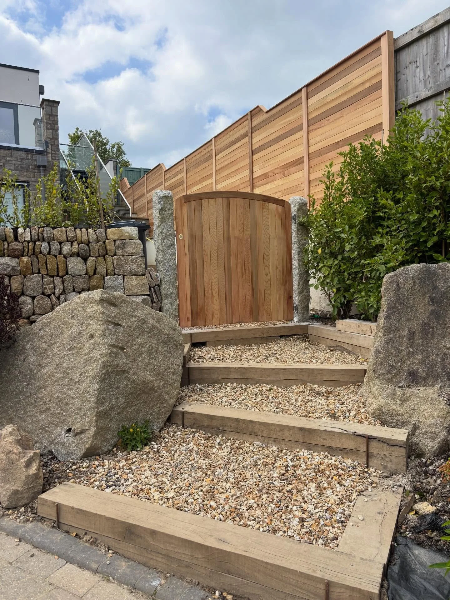 Finished elements of our Boskerris project!

Walling and sleeper steps were a way to improve the massively sloping garden and poor workmanship of the new build grounds. 

@caradonstone supplied us with the lovely silver posts, which give the project 