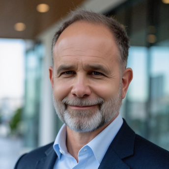 Silhouette of a person with short hair, backlit by a bright circular light, creating a dark profile against the illuminated background.