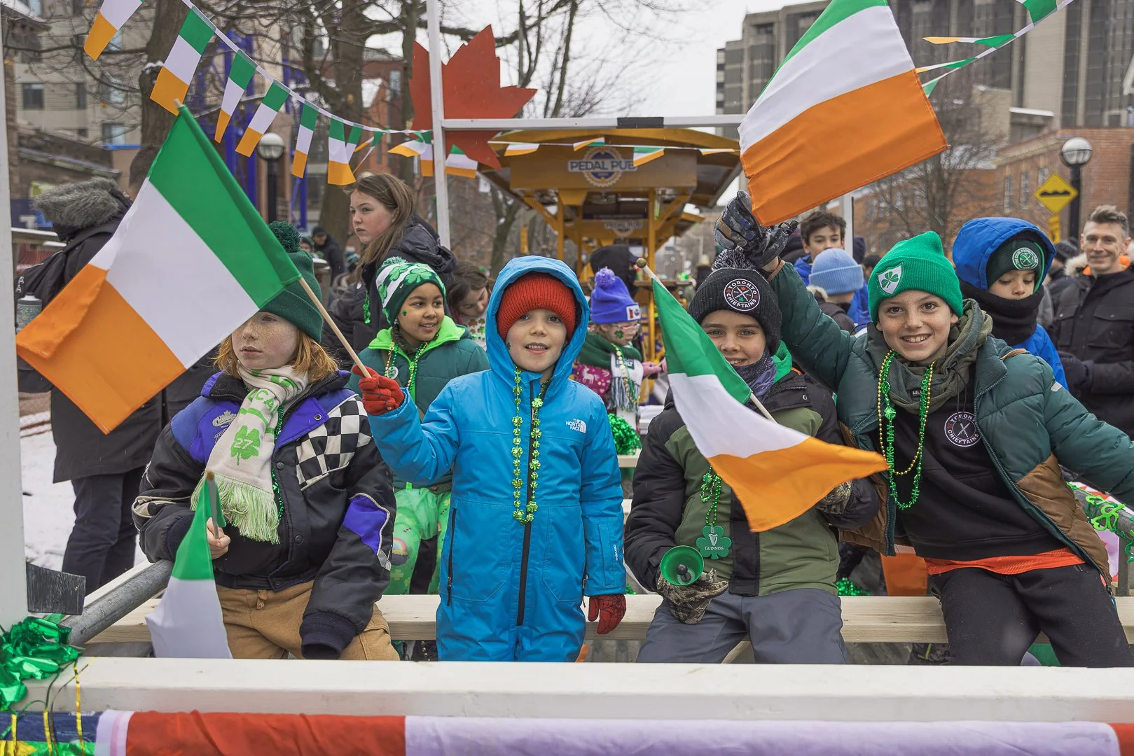 Families and children celebrating at the 2026 Toronto St. Patrick’s Parade