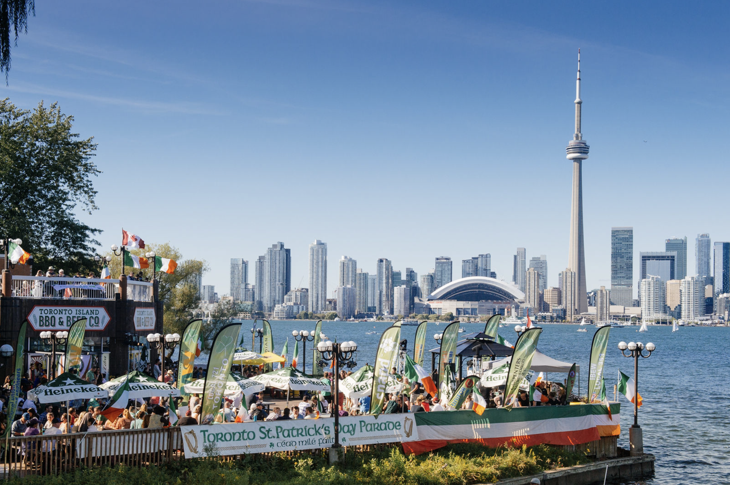 Celtic Island Music Festival at Toronto Island BBQ & Beer Co. with the Toronto skyline in the background.