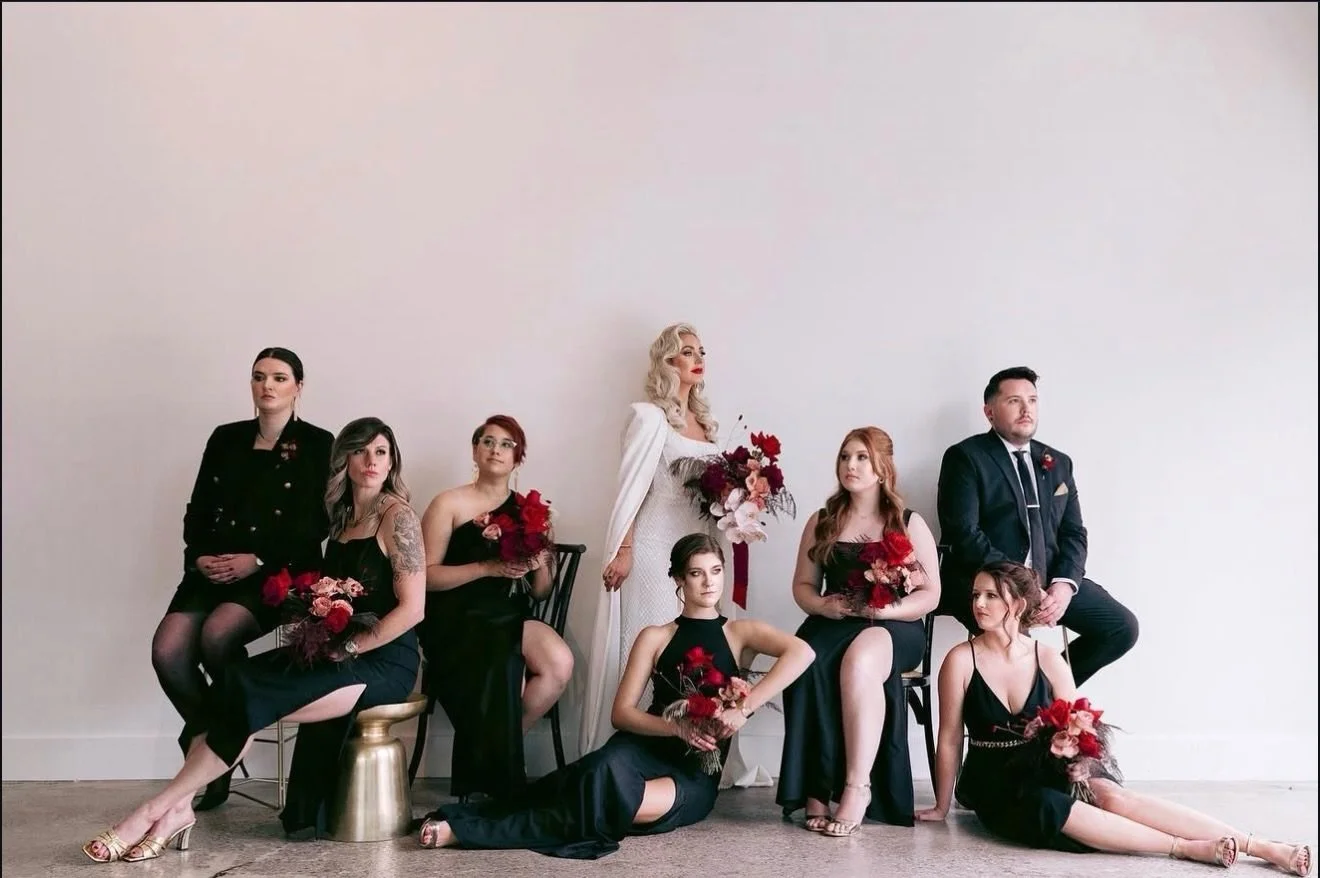 Wedding party lineup, but make it intentional, not traditional.

This bride wanted bold energy, rich color, and a look that felt different the second you saw it. The diamond pattern from her dress inspired design details across the day, and the weddi