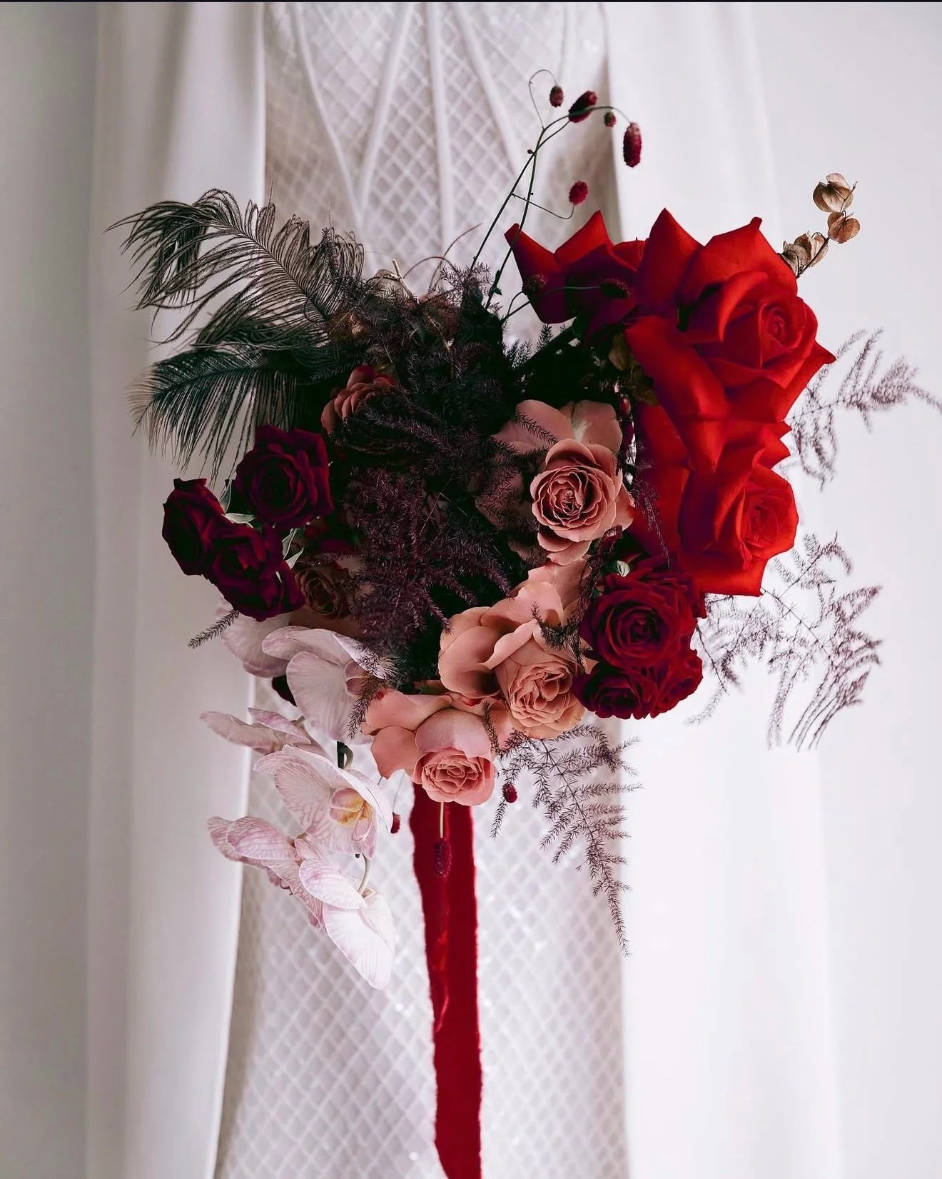 The dress set the design direction &mdash; everything else followed the thread.
 That diamond pattern wasn&rsquo;t just on the gown &mdash; it became part of the aisle layout, signage, and tabletop details, creating cohesion guests could actually spo