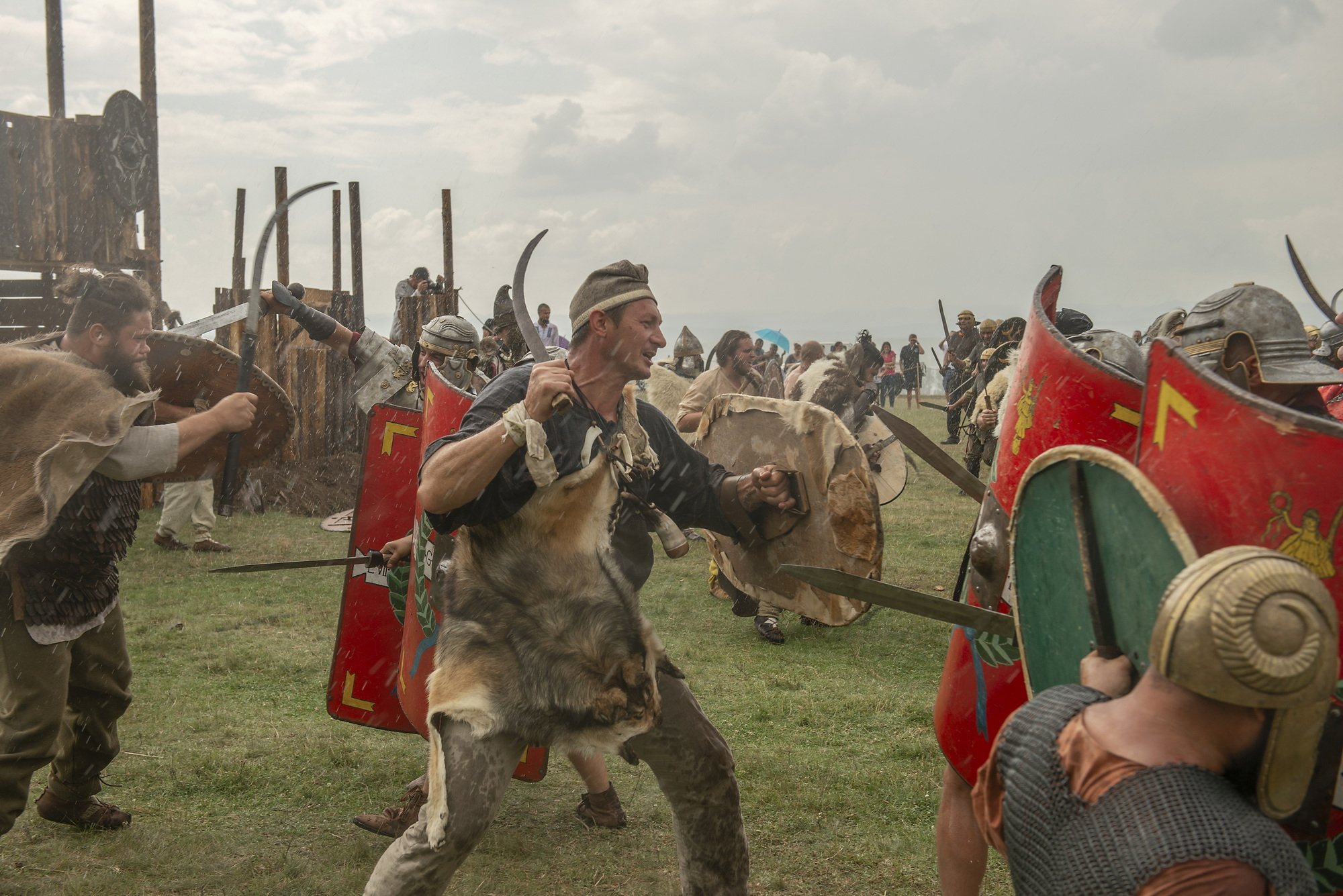 Dacian re-enactors in a battle against the romans