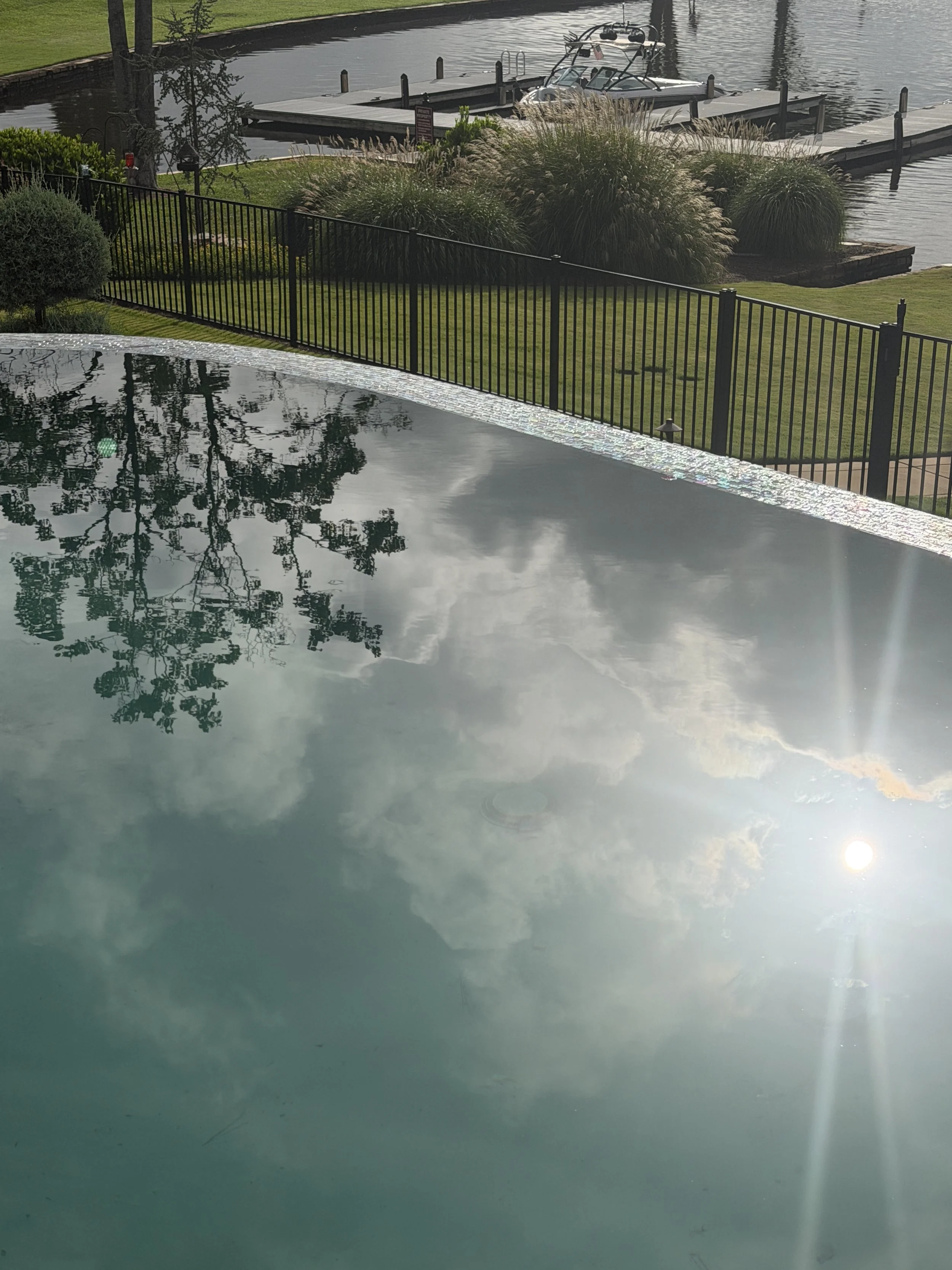 Infinity-Edge vs. Perimeter-Overflow Pools