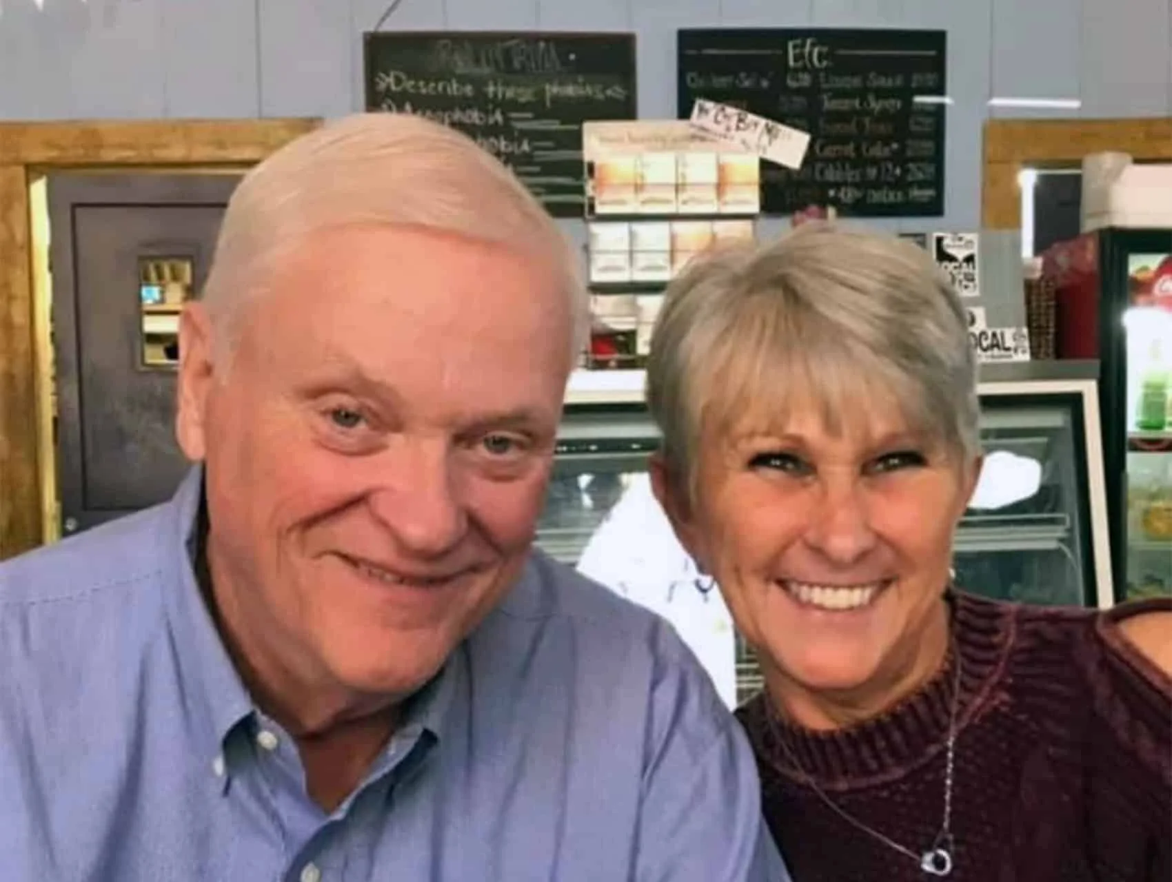 Dan Notch and his wife smiling in a cafe