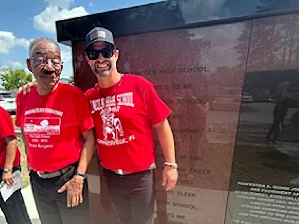 Two ot davis monuments employees