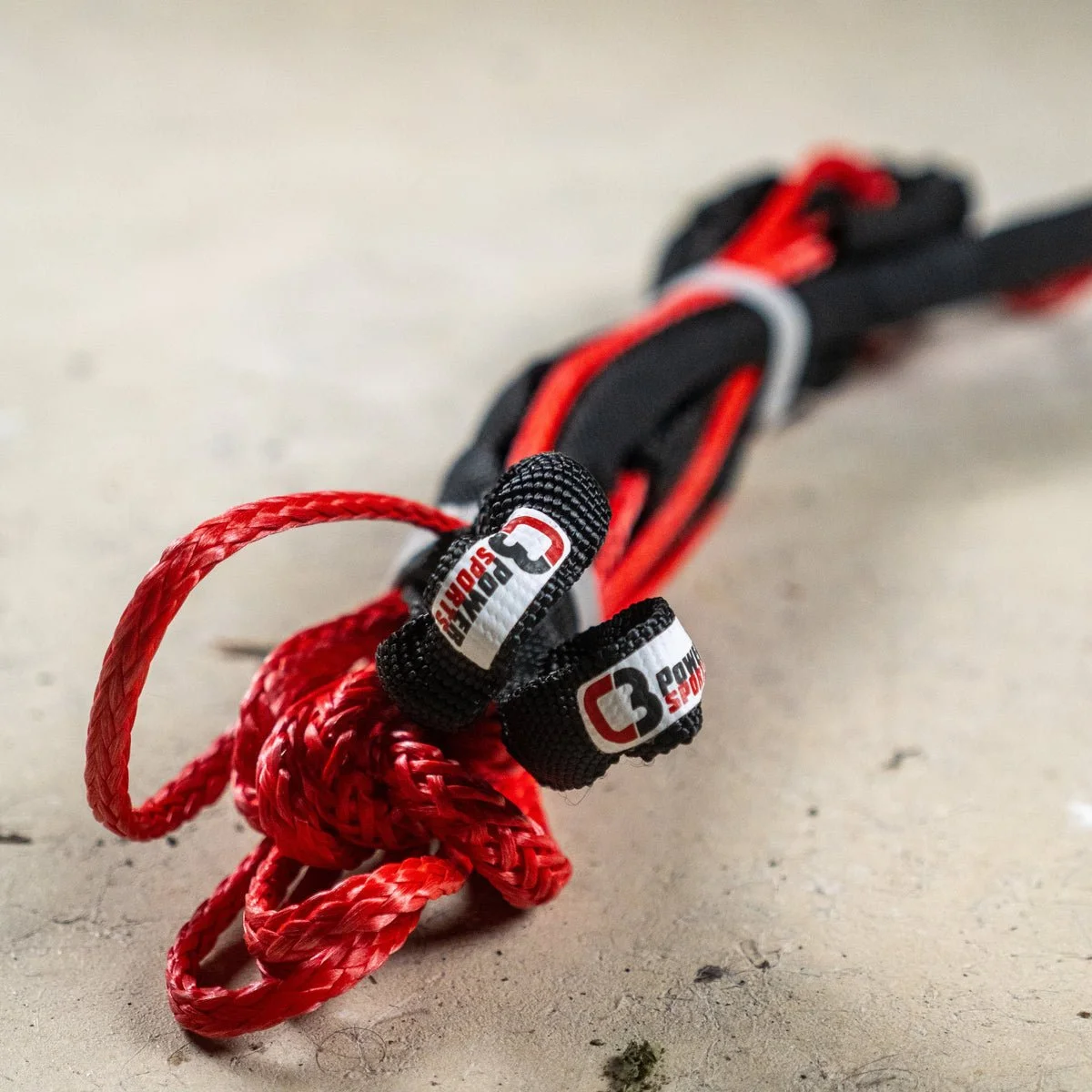 C3 Snowbike Tow Strap with red braided rope and black protective loop sleeves
