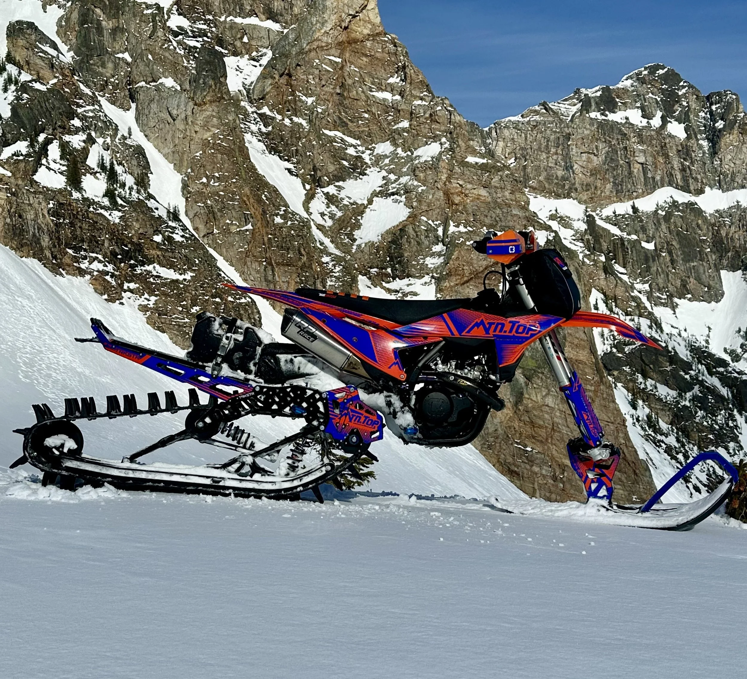 Allen Mangum's 2026 KTM 450 SX-F snowbike with an MTN.TOP TRKSTR 126 in the Island Park backcountry