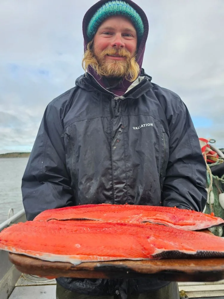Captain Jake Filarski with fresh-caught salmon filets, ready for the best dinner out of Bristol Bay.