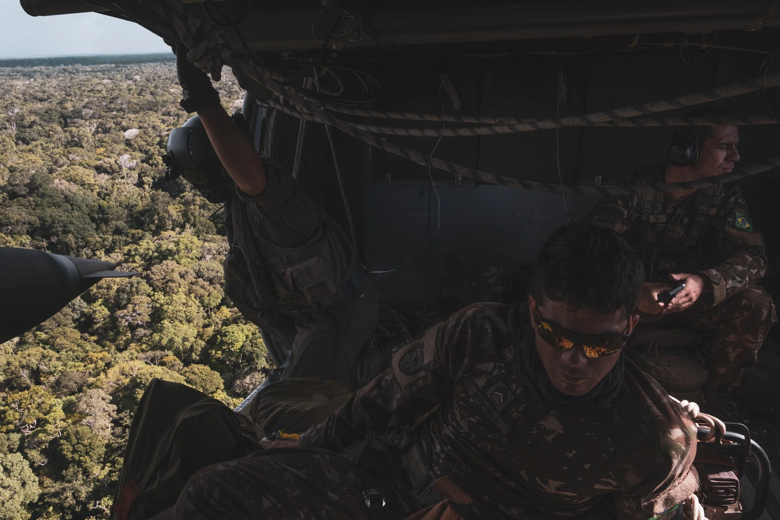 A Brazilian Army unit flies over the Ipiranga region to deliver equipment to a special forces team camped along the border, in an area where the army recently engaged with the Colombian guerrilla group Comando de la Fronteira, accused of trafficking 