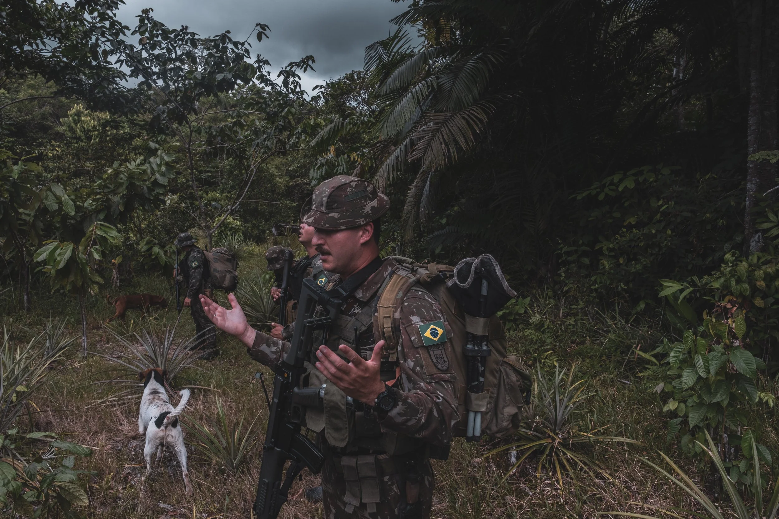 Lieutenant Commander Arruda prays before the start of an operation in the jungle along the Colombian border to patrol a trail where the Brazilian Army recently engaged with the Colombian narco-guerrilla group Comando de la Frontera, which was smuggli