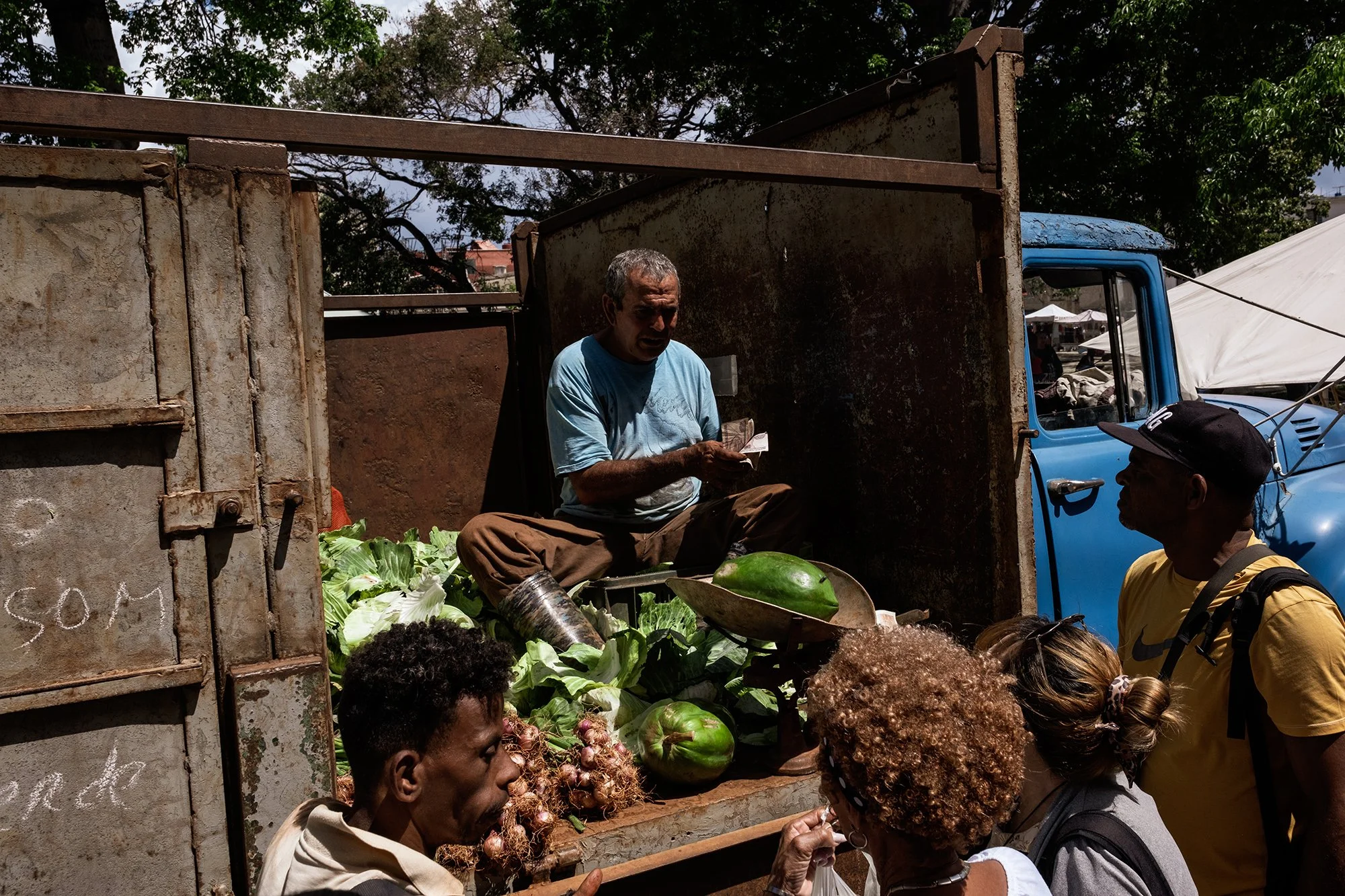 A fruit and vegetable street vendor at a local market in Havana. 