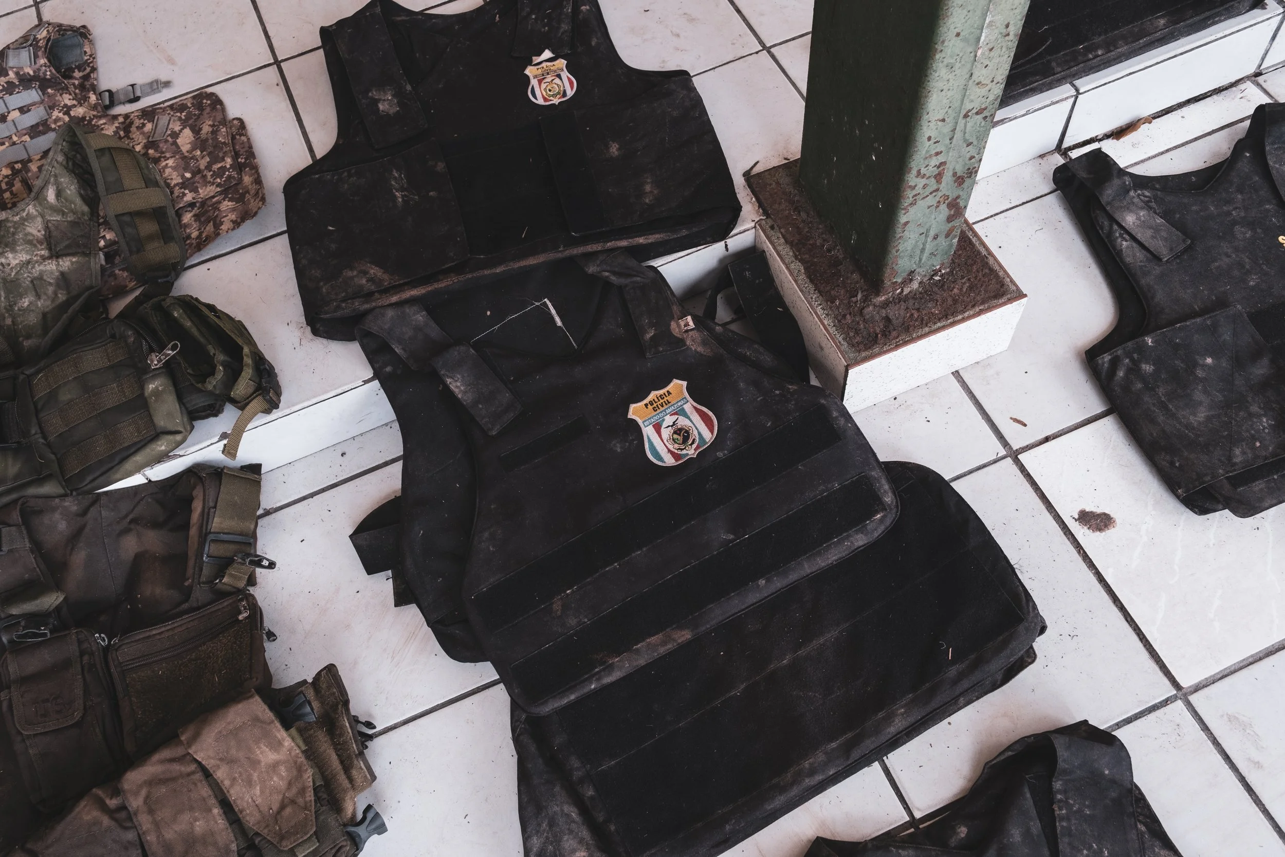 Bulletproof vests belonging to the Brazilian Civil Police, found in possession of a Colombian-Brazilian criminal organization involved in drug trafficking, are stored inside the Brazilian Army battalion in Tabatinga after being seized during a joint 