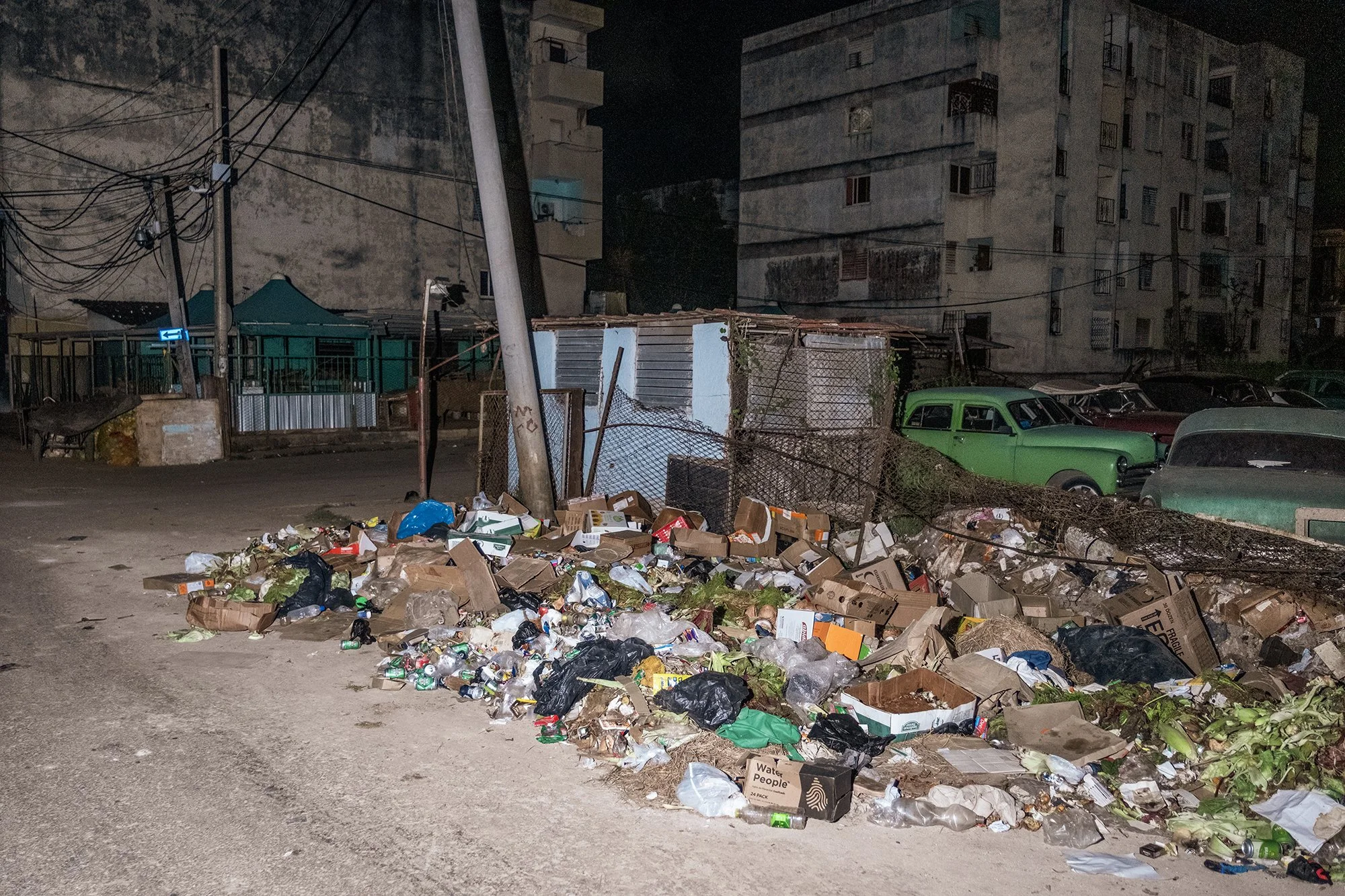 Piles of uncollected waste line a street in downtown Havana. 