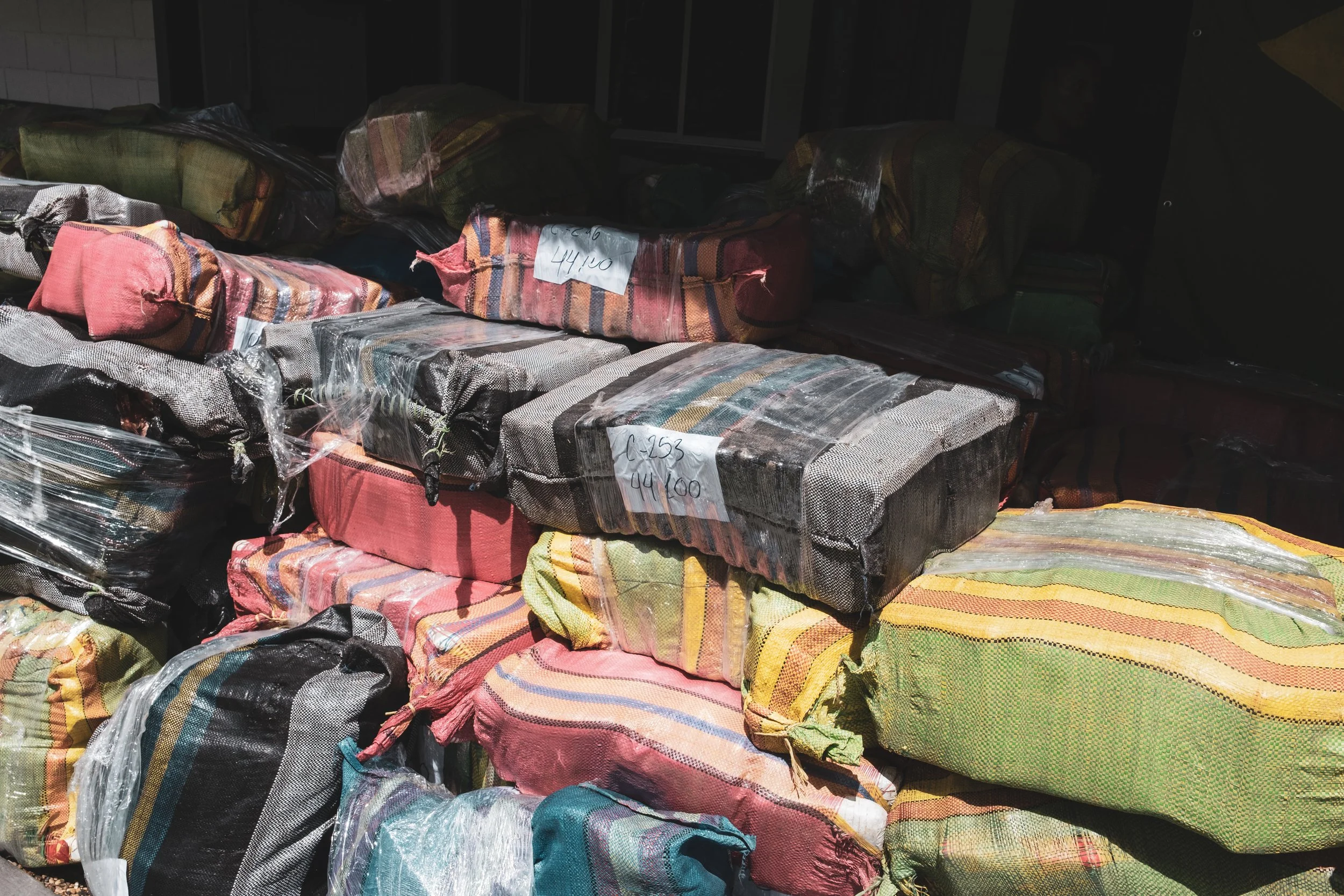The 14-ton marijuana seizure, resulting from a joint operation between Brazilian and Peruvian forces, is stored inside the Brazilian Army battalion in Tabatinga.
