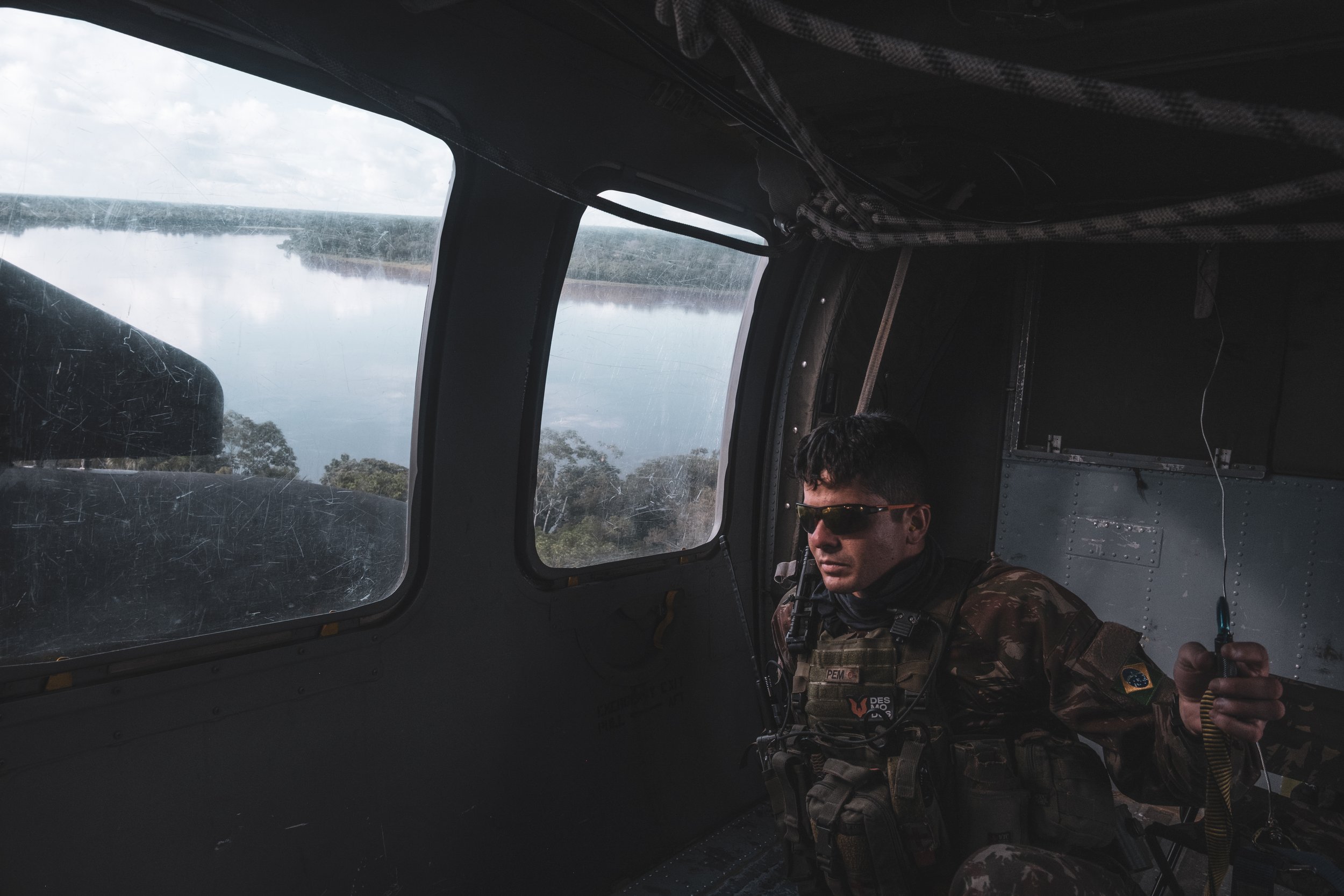 A Brazilian Army unit flies over the Ipiranga region to deliver equipment to a special forces team camped along the border, in an area where the army recently engaged with the Colombian guerrilla group Comando de la Fronteira, accused of trafficking 