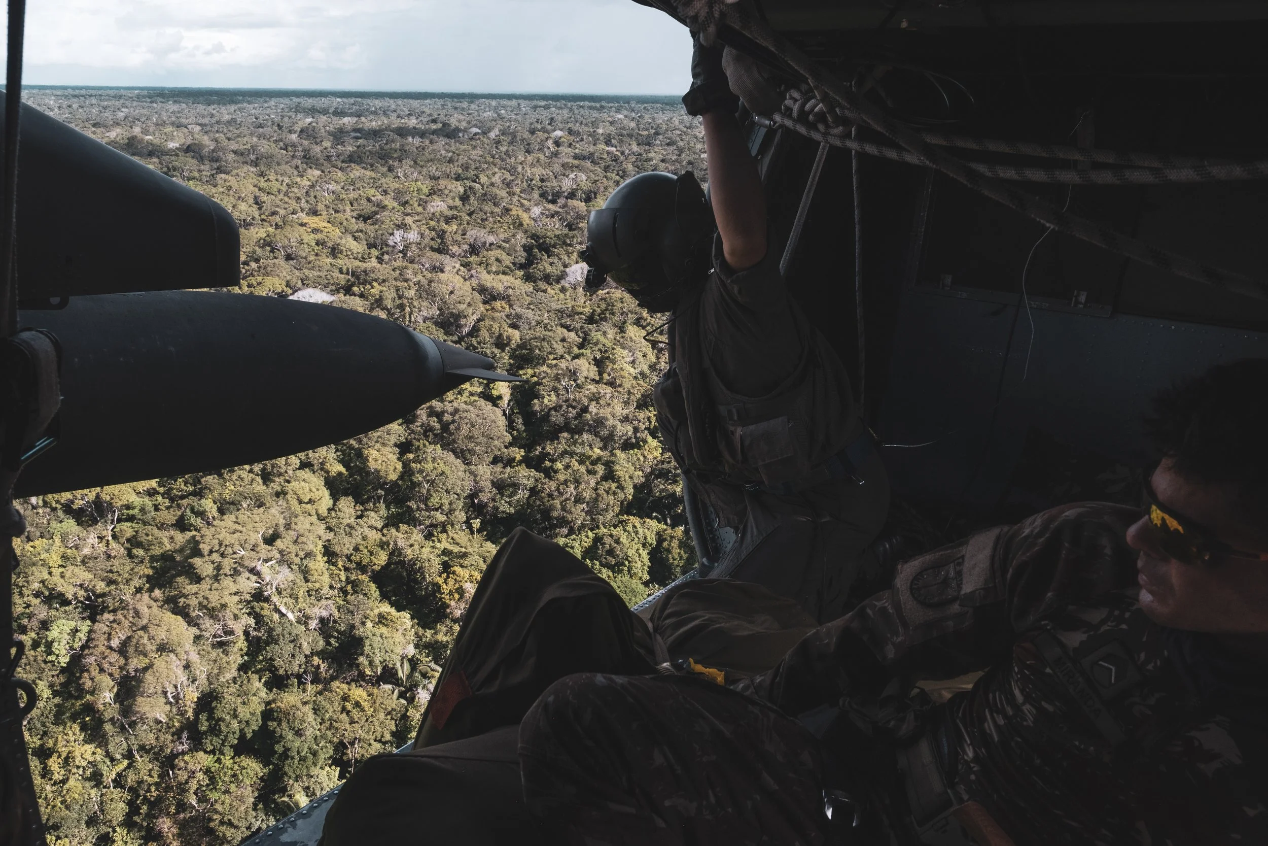 A Brazilian Army unit flies over the Ipiranga region to deliver equipment to a special forces team camped along the border, in an area where the army recently engaged with the Colombian guerrilla group Comando de la Fronteira, accused of trafficking 