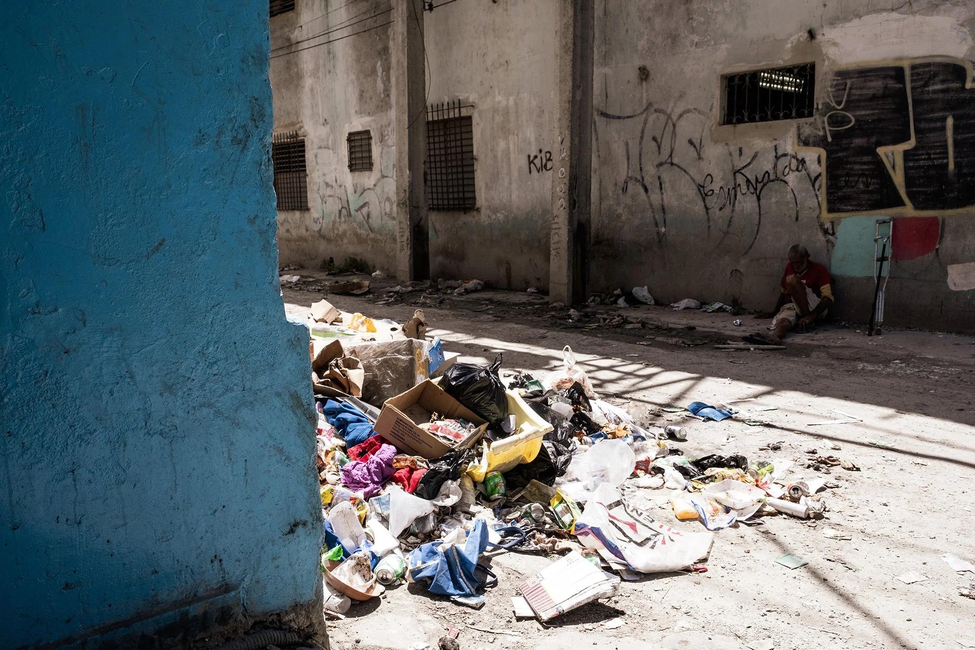 Uncollected waste line a street in downtown Havana.