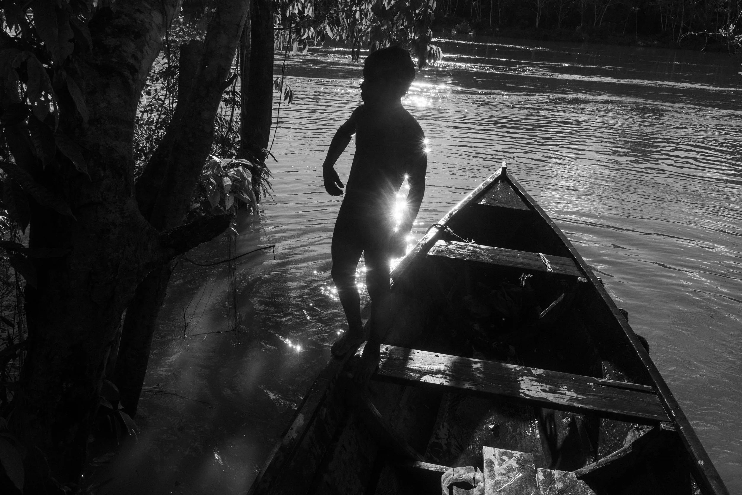 Mayoruna children playing along the Curuçá River inside the Vale do Javari Indigenous Territory, Amazonas, Brazil.