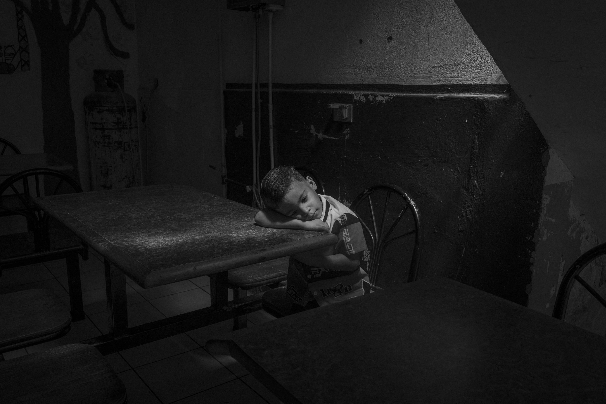 Angel, 5, rests inside a migrant shelter in Ciudad Juarez.