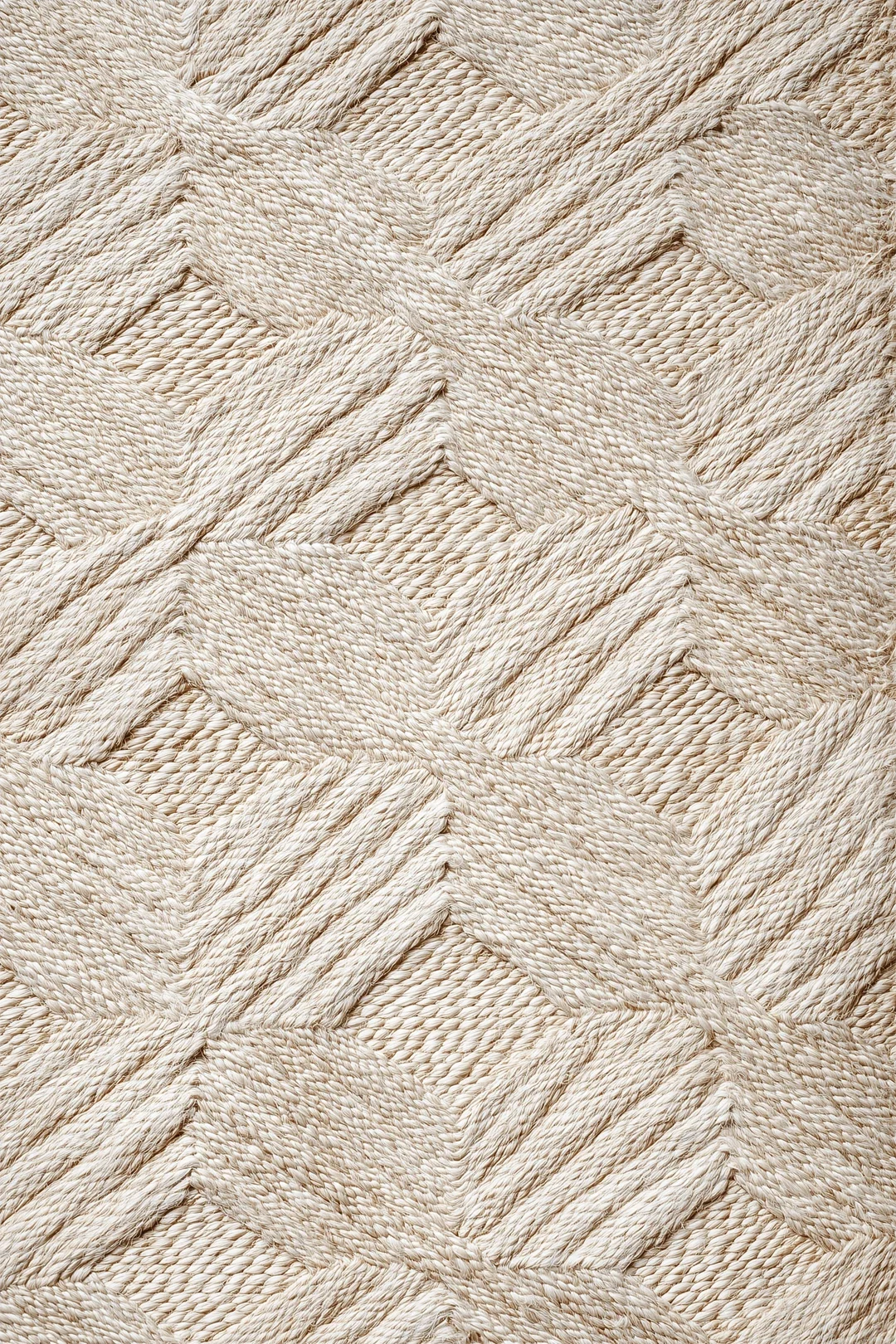 studio-sakaia-bleached-jute-rug-on-oak-floor-topdown.webp
