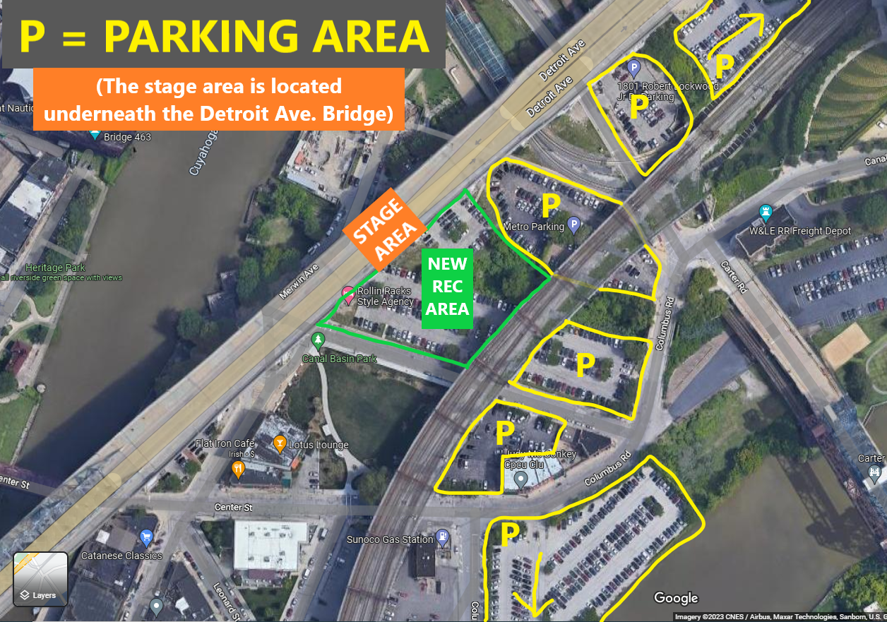 A map showing parking areas marked with yellow lines labeled P, a stage area marked in orange, and a new recording area in green, located under the Detroit Ave. Bridge over the Cuyahoga River in Cleveland, Ohio.