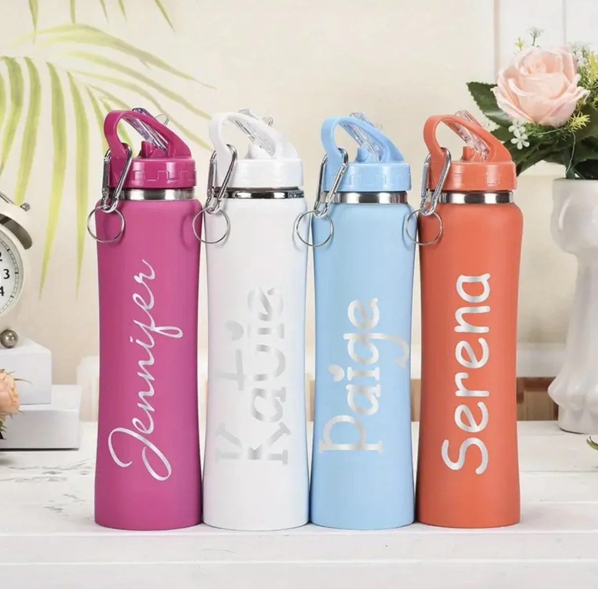 Personalized water bottle with straw.