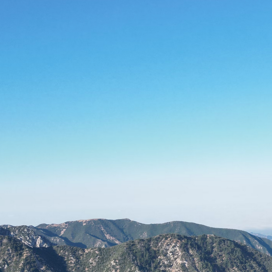 Scenic California mountain range, representing certified contractors offering rebate-eligible HVAC services.