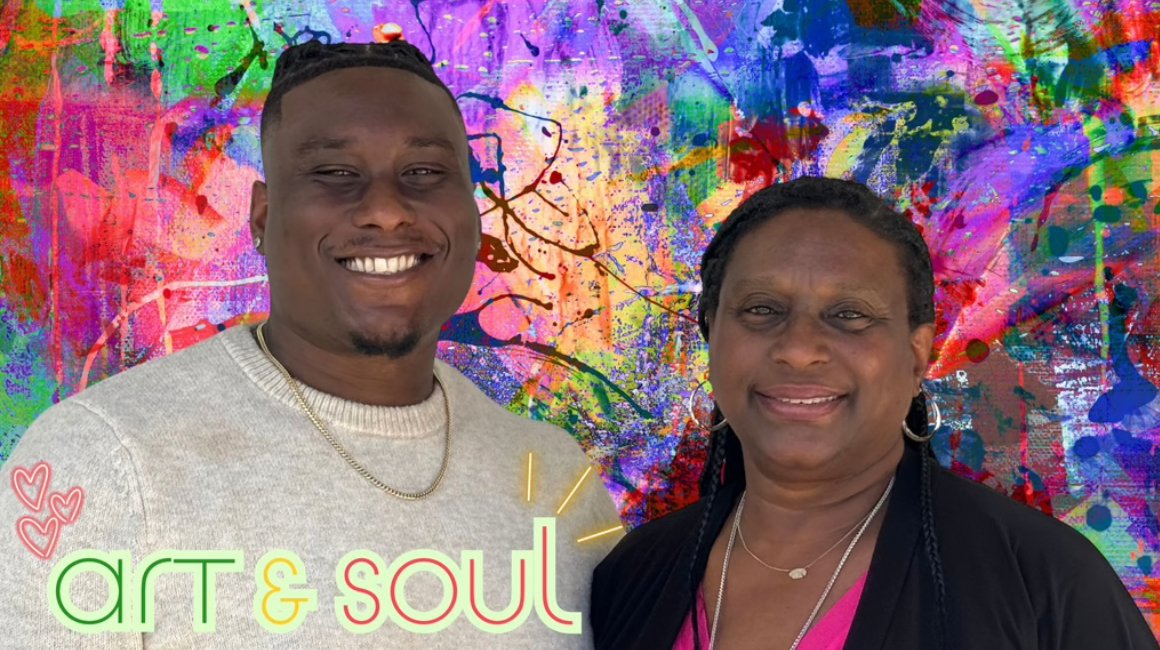 A smiling young man with short hair and a gold chain standing next to an older woman with braids, both in front of a colorful, abstract paint splatter background. The text 'art & soul' is written at the bottom in green, yellow, and red with small pink hearts nearby.